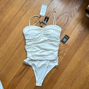 Express ruched body contour compression bodysuit